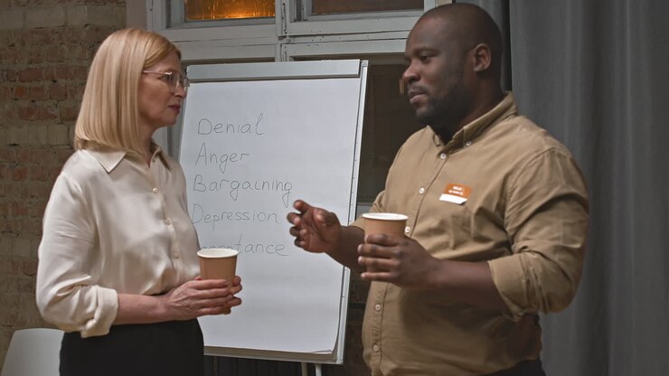 Black Man Talking with Specialist at Mental Support Group Session