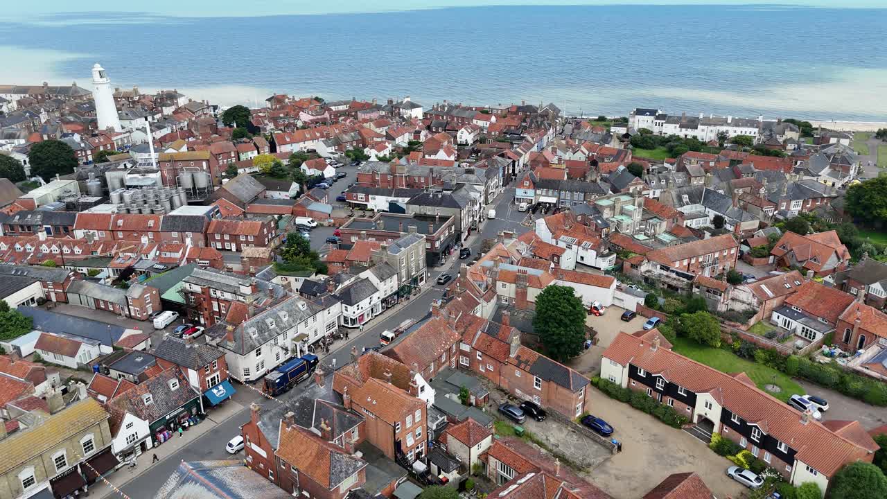 Southwold Suffolk seaside town UK pull back drone aerial reverse reveal