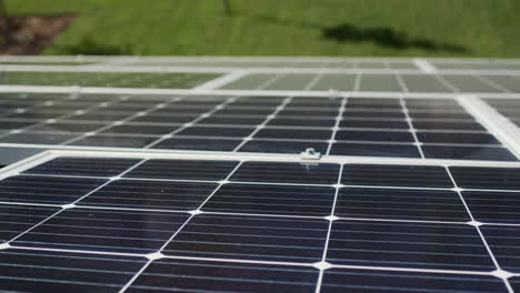 Solar-panels-installed-on-the-roof-of-the-cottage.-Below-you-can-see-the-green-lawn