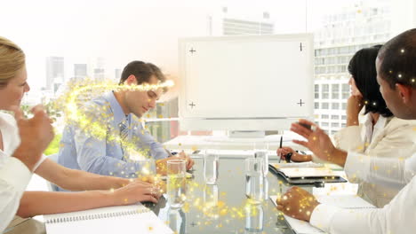 golden shooting star against businesspeople having a video conference in a meeting room at office