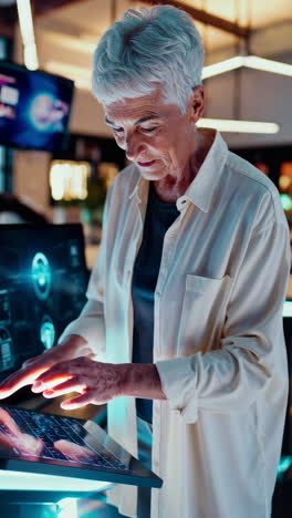 senior woman interacting with a futuristic touchscreen display
