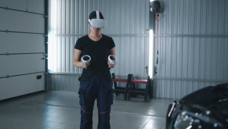 woman using vr headset and controllers in a garage