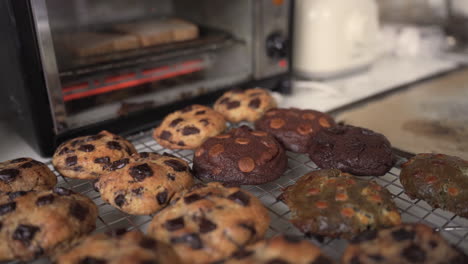 tempting assorted cookies on a cooling rack outside the oven