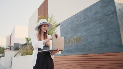 woman working on laptop outdoors