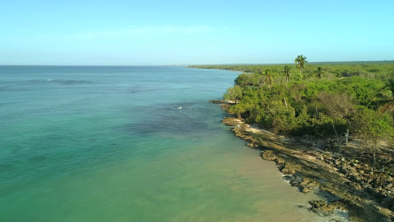 Coast of Bayahibe seen from drone. Dominican Republic. Aerial forward