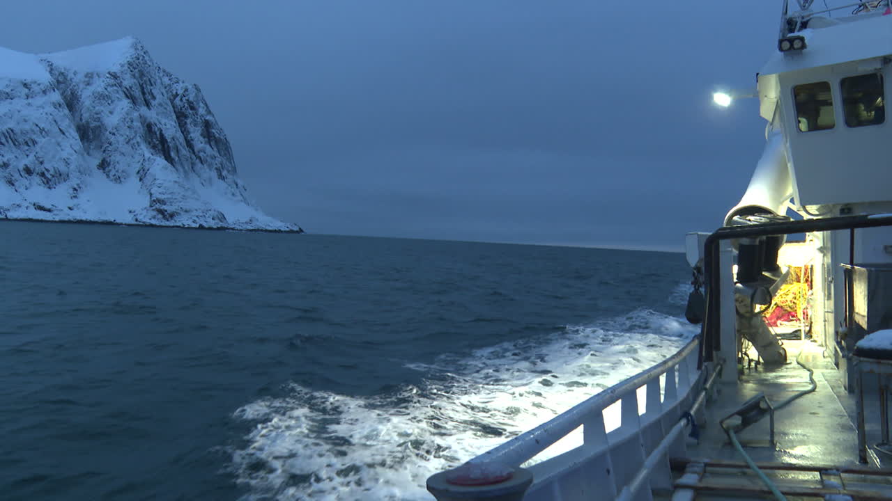 Fishing Boat in Arctic Waters at Dusk