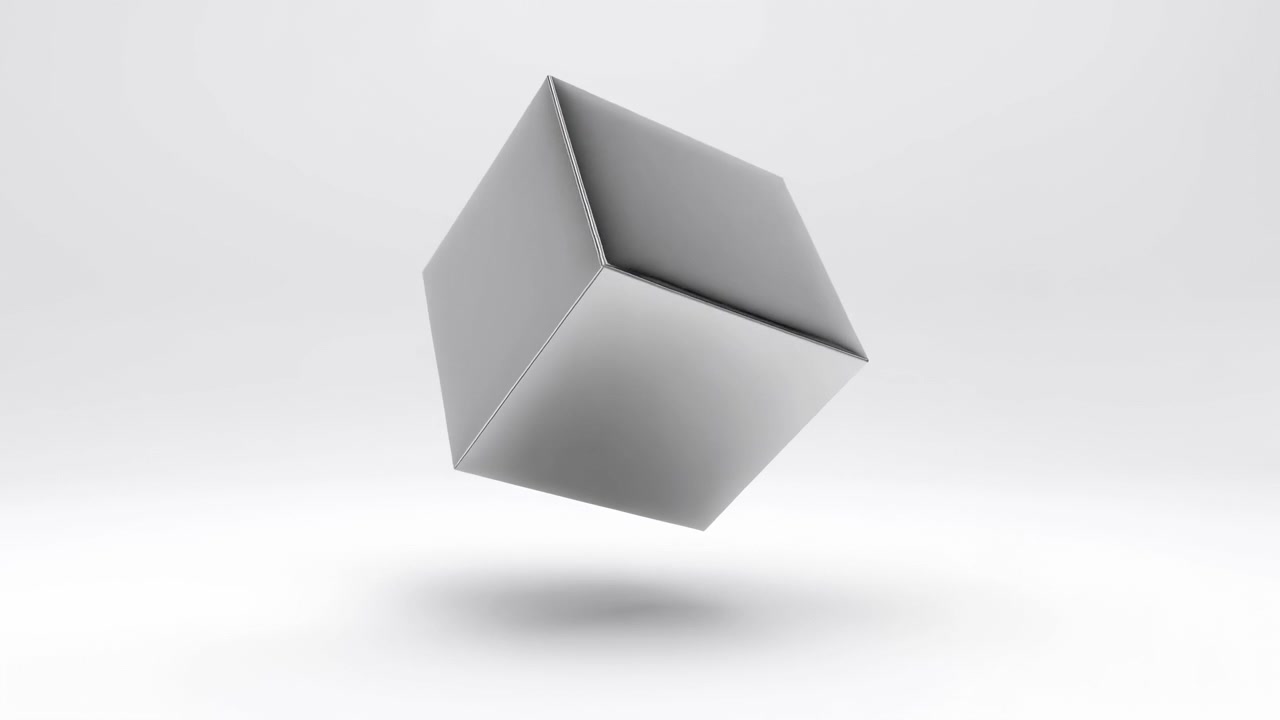 Mirror-polished chrome cube rotates and tilts above seamless light gray backdrop, showing crisp reflections, soft diffuse studio light, subtle shadow, and minimal commercial presentation
