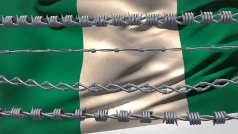 barbed wires against nigeria flag