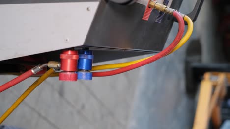Automotive AC charging hose and machine
