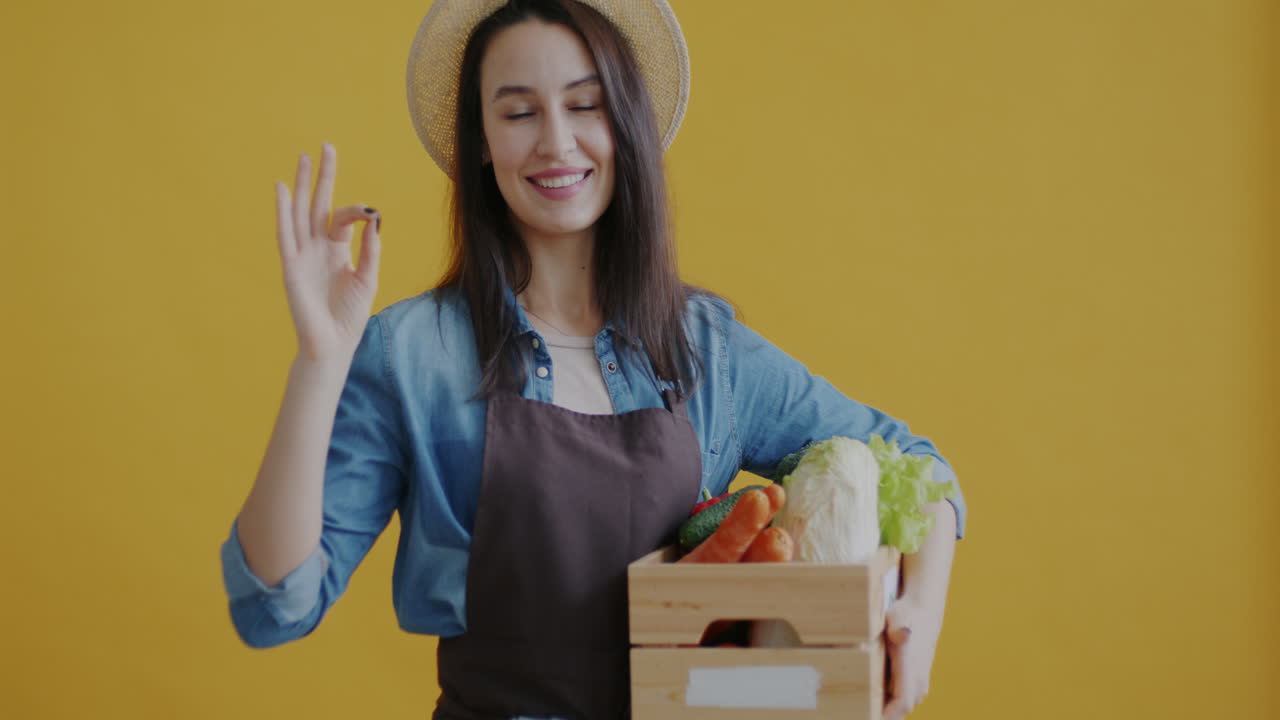 Woman Farmer Holding Fresh Vegetables