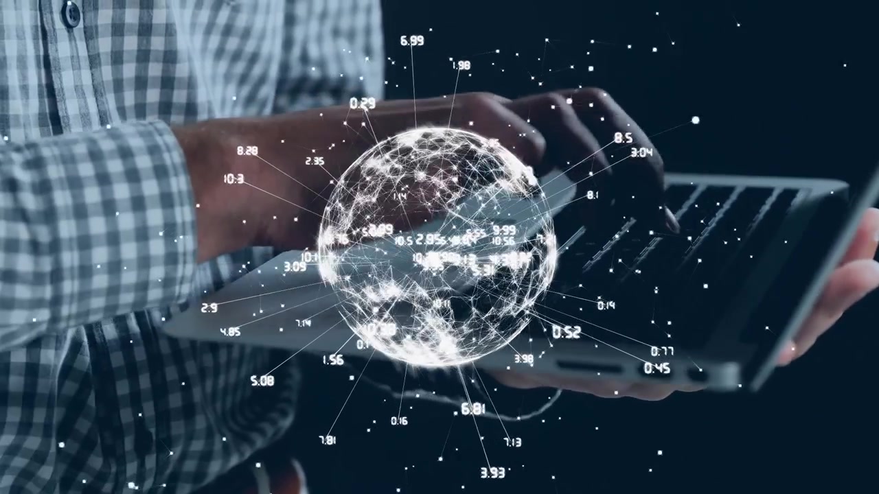Animation af en globus med et netværk af forbindelser over midtersektionen af en mand, der bruger bærbar computer på kontoret.