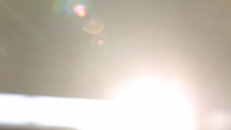 blurred scene of sunlight coming through window slit. gimbal, pedestal down