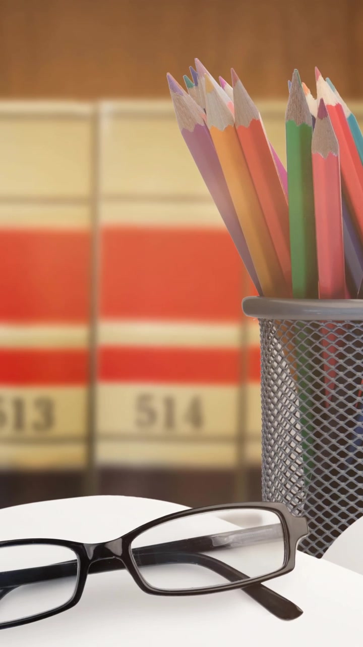 Animation of school items and books in row in background