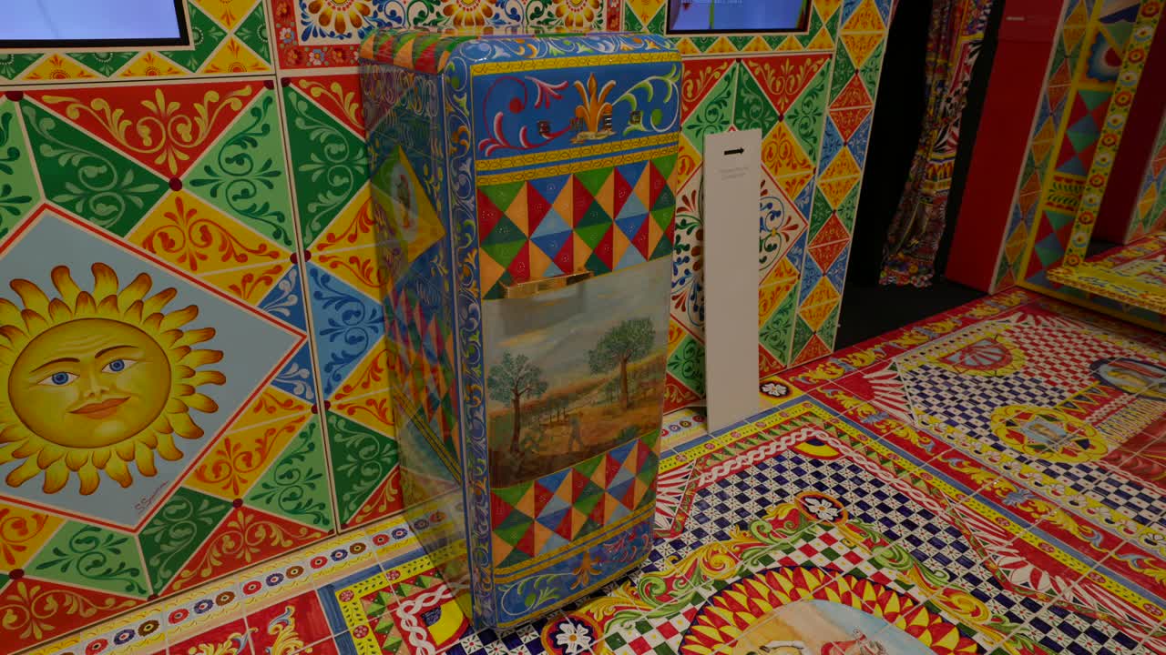 Bright and detailed mosaic tile artwork featuring various colorful patterns and intricate designs, showcasing a vibrant and artistic composition at Dolce And Gabbana Exhibition