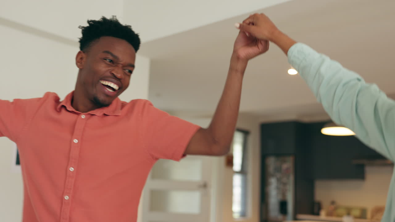 Love, home and black couple dance together happy