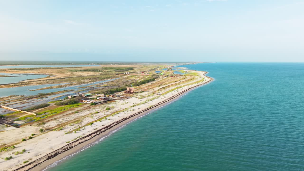 Aerial sidaways view of the beautiful mayapo beach coastline in la guajira, colombia