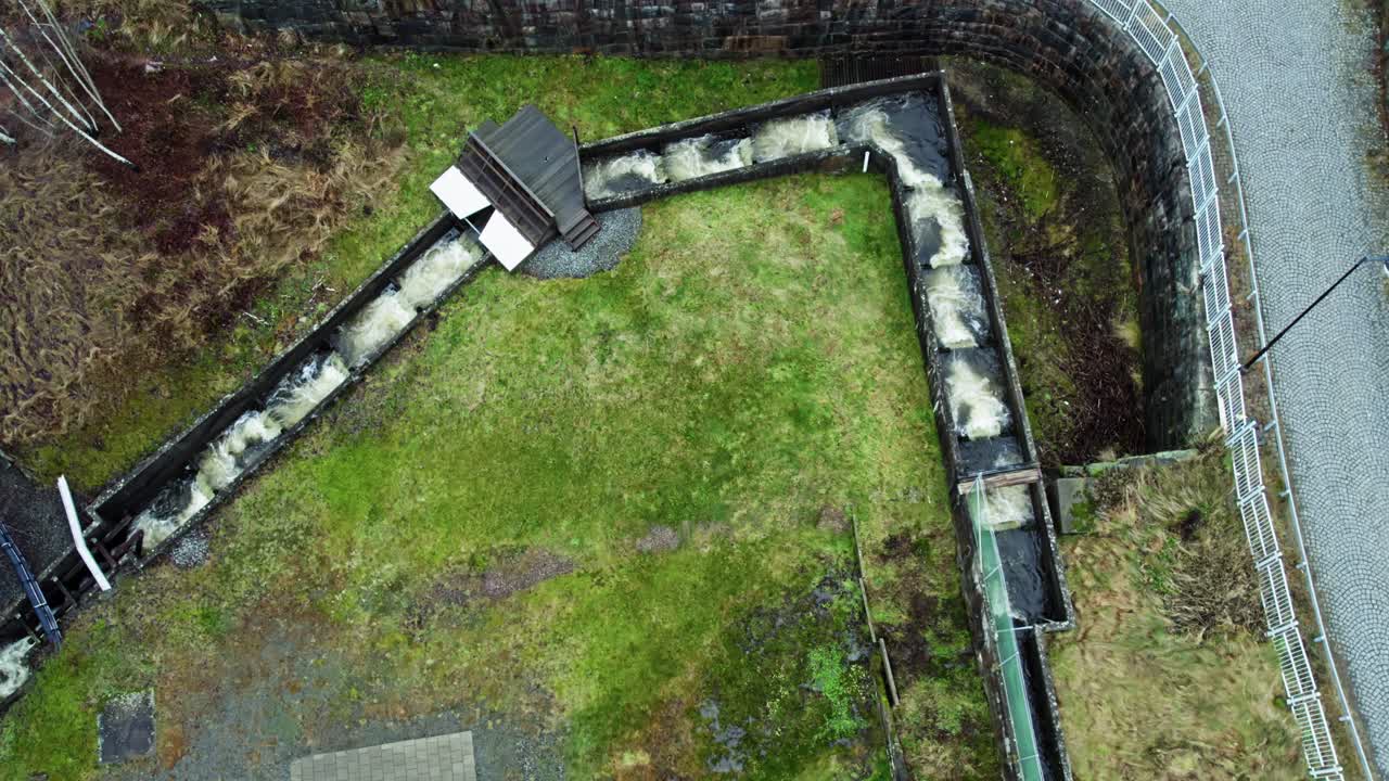 Above View Of A Fish Ladder With Artificial Barriers In A River Dam. Aerial Shot