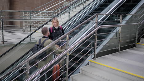 couple on an escalator