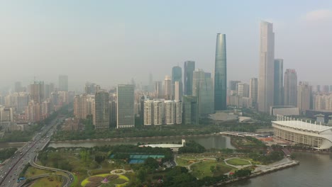 sunny evening guangzhou city downtown famous island stadium riverside aerial panorama 4k china