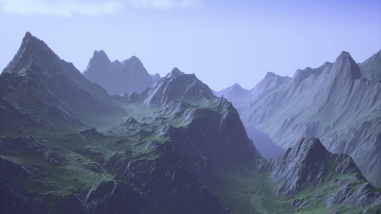 Majestic mountain range under soft sunlight during early morning hours