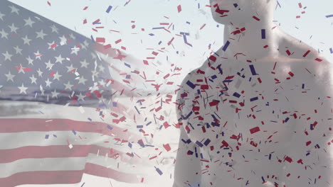 animation of american flag waving and confetti falling over man admiring view on the beach