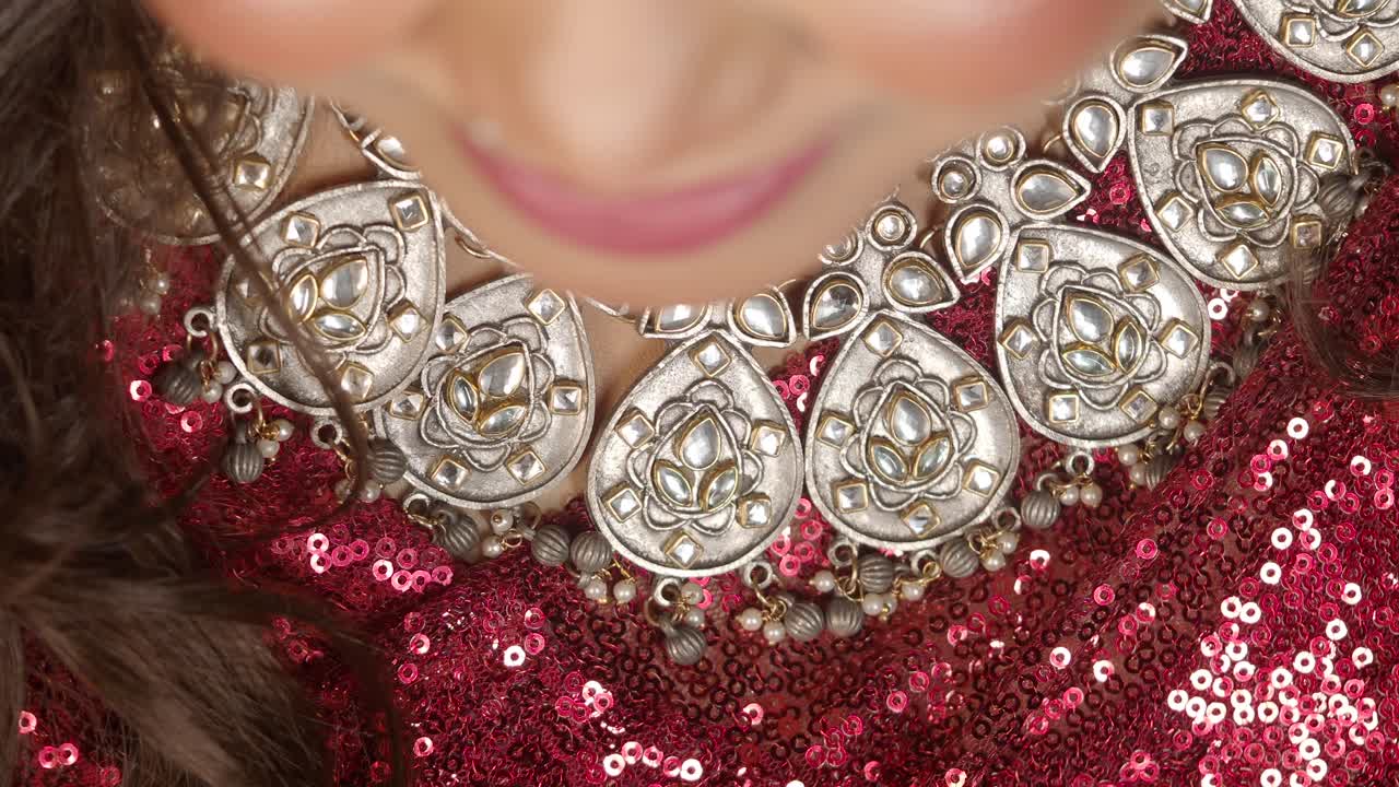 Close-up of a woman wearing a necklace