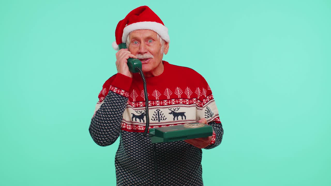 크리스마스 할아버지, 80년대의 빈티지 전화로 얘기하는 남자, '안하세요, 저한테 전화해 주세요.'