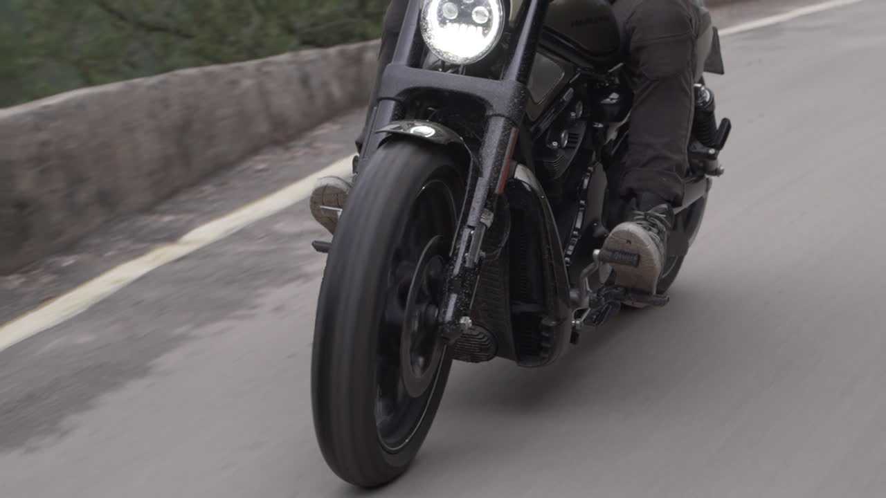 Motorcycle Rider on a Winding Road