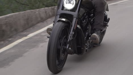 motorcycle rider on a winding road