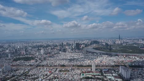 ho chi minh city drone hyperlapse on sunny day with blue sky and moving clouds