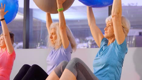 Senior-women-performing-yoga-4k