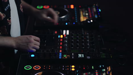 dj mixing music in a nightclub