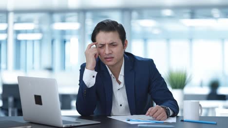 confused indian businessman thinking about something