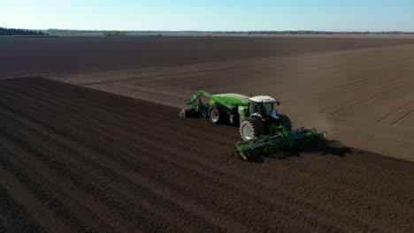 tractor preparing a field for planting