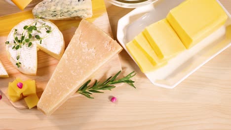 assorted dairy products on a wooden background