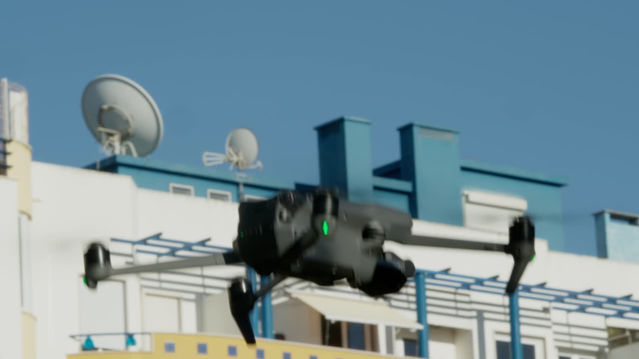 Static shot of drone flying in the air.