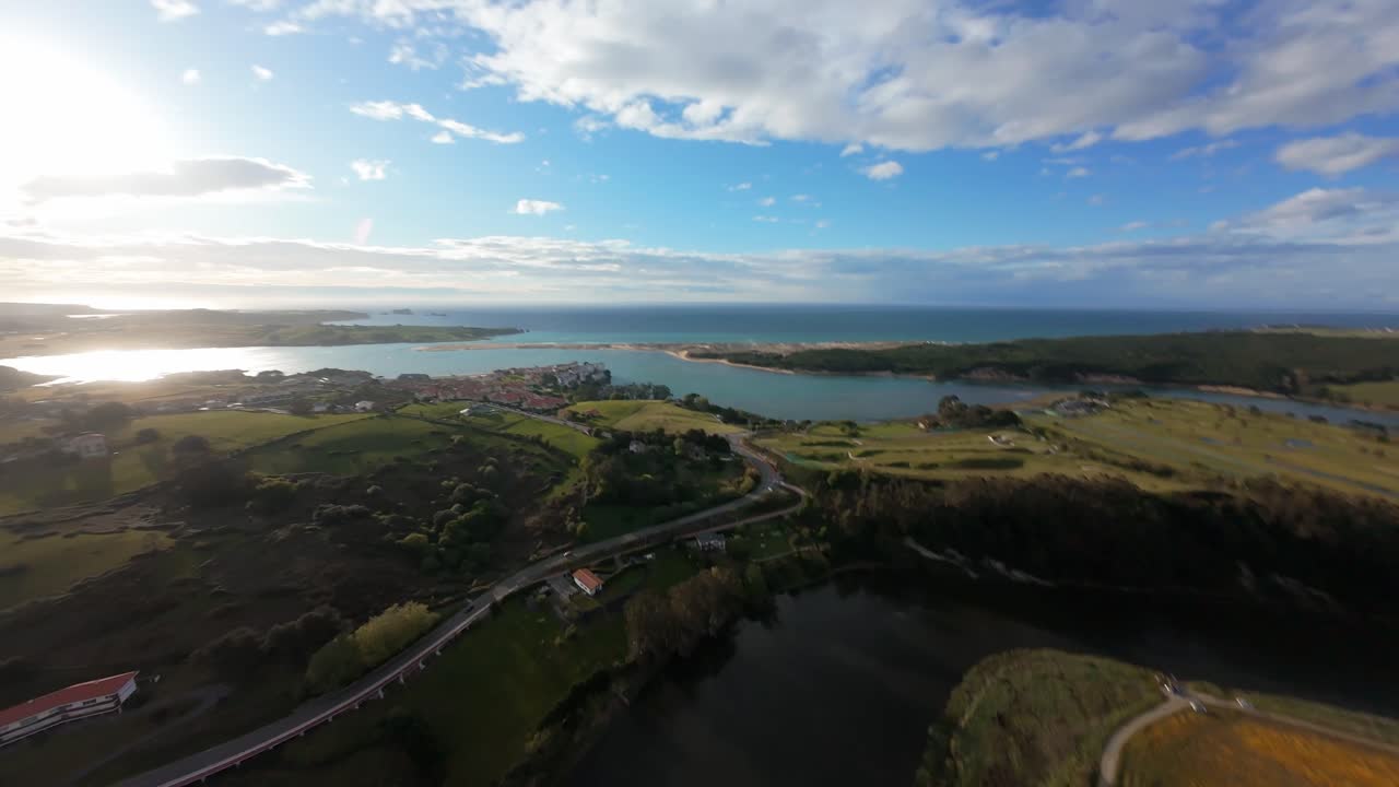Aerial Drone Shot and dive in a river in Liencres (Cantabria)