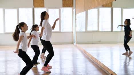 Teacher-and-pupils-in-dance-class