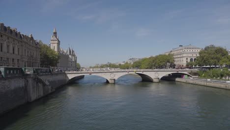 pont saint michel bridge crossing river seine in paris france with tourists and traffic 4