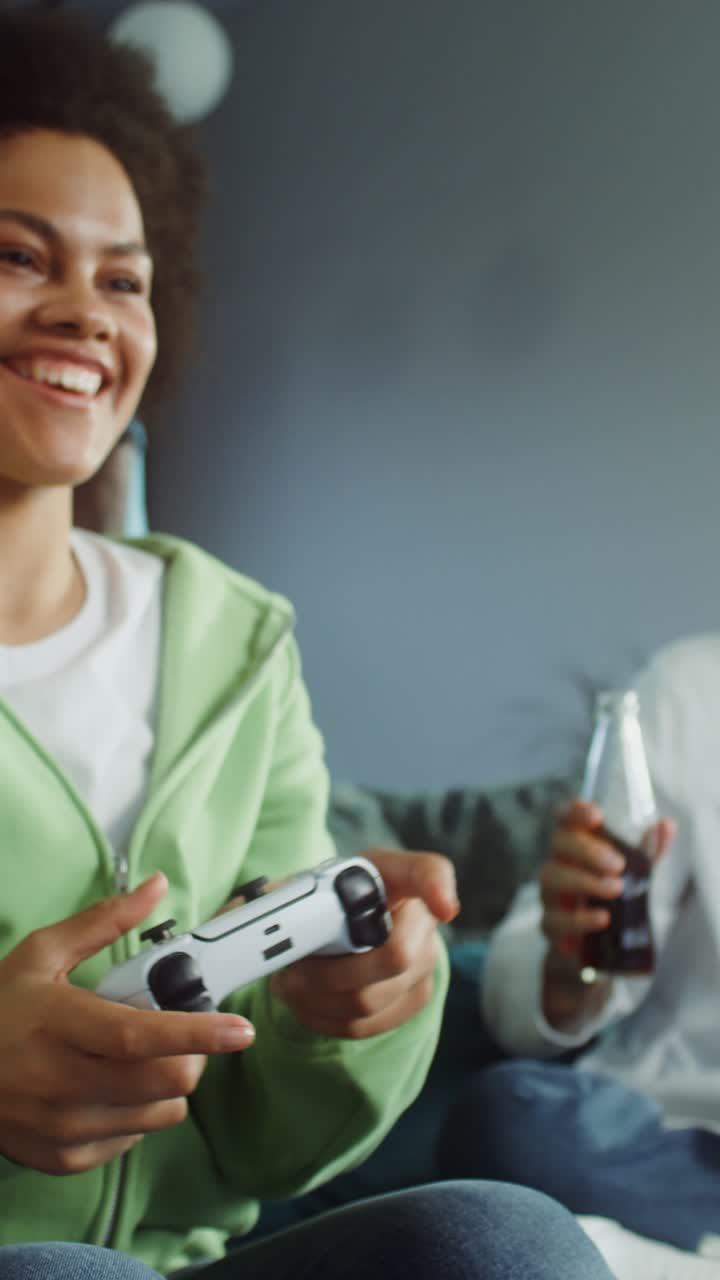 People sitting indoor playing video game