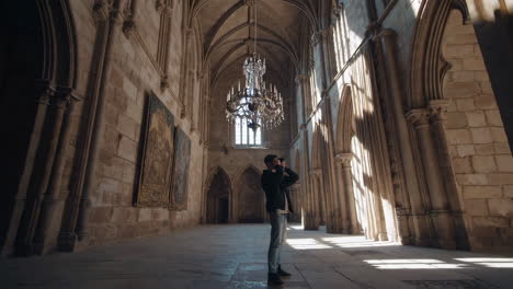 photographer capturing the grandeur of a historic cathedral
