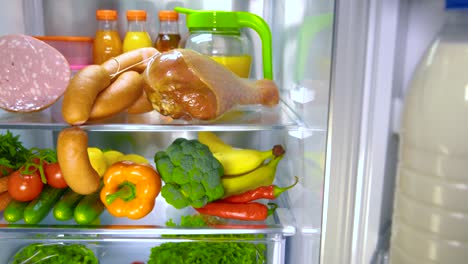 open refrigerator filled with food