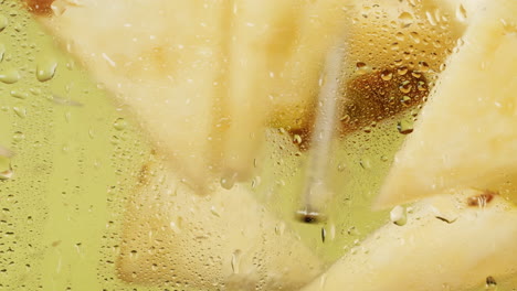 close-up of sliced pears with water droplets