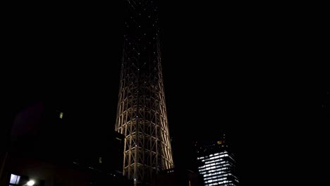 nighttime view of a tower lighting up sequentially