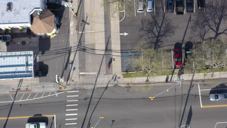 A-top-down-shot-taken-over-a-quiet-suburban-neighborhood-on-a-sunny-day