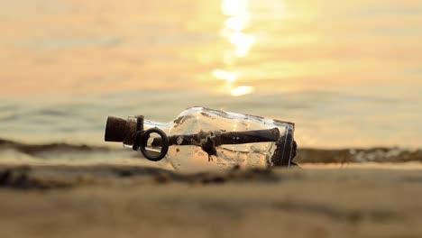 message in the bottle against the sun setting down