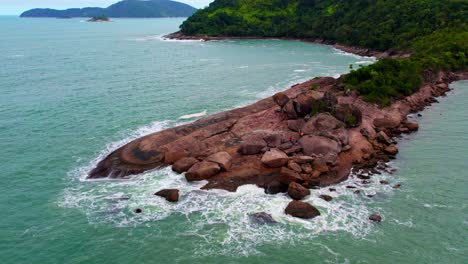 Camera-focusing-on-the-rocky-cliff-along-the-sea-shore