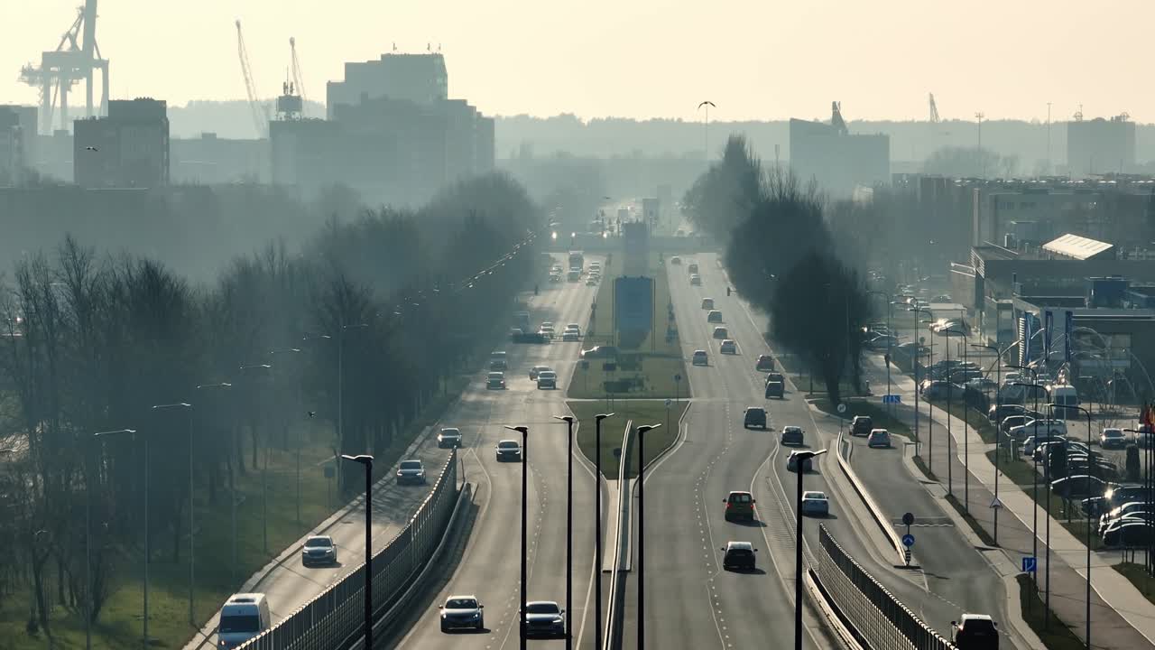 The panoramic view of the city was obscured by dry air, smog, and a large amount of dust. Europe, Lithuania, Klaipeda.
