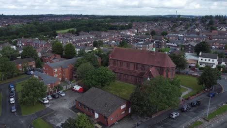 suburban neighbourhood residential british housing estate homes aerial view pan right