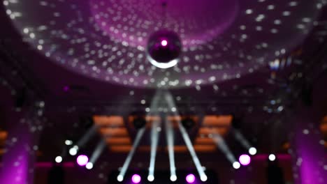 disco ball, view from below, from the disco ball beams, stage light, mirror ball